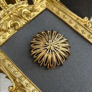 Vintage Monet Gold Sunburst Floral Brooch